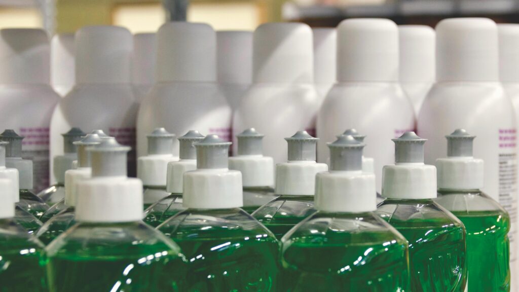 pexels-photo-592670-592670 Close-up view of green liquid in bottles, ideal for household cleaning and stocks.